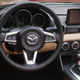 Illustration for article titled 2019 Mazda Miata VS. 2018 Volkswagen Golf GTI: Which To Buy?